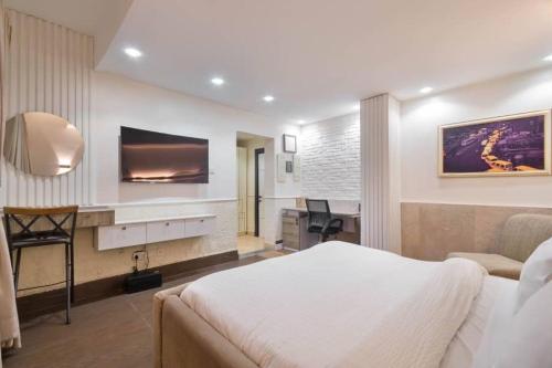 Ένα ή περισσότερα κρεβάτια σε δωμάτιο στο Hunters Cove Apartment