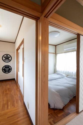 House in Tenjinzakiにあるベッド