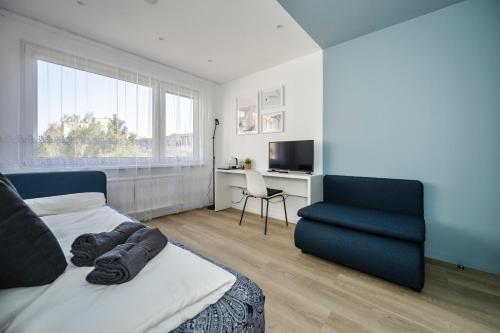 TV a/nebo společenská místnost v ubytování GoldenHugo rooms