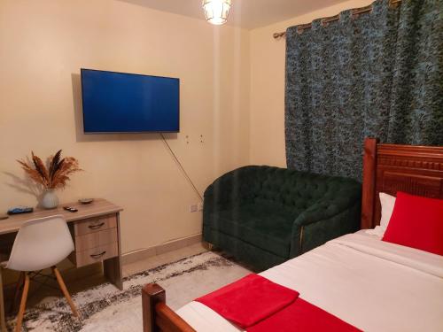 TV a/nebo společenská místnost v ubytování Jays staycation Syokimau