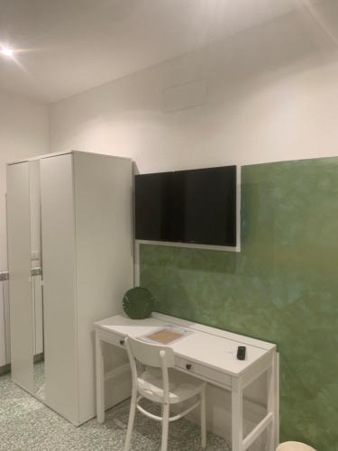 TV a/nebo společenská místnost v ubytování B&B La Scalina