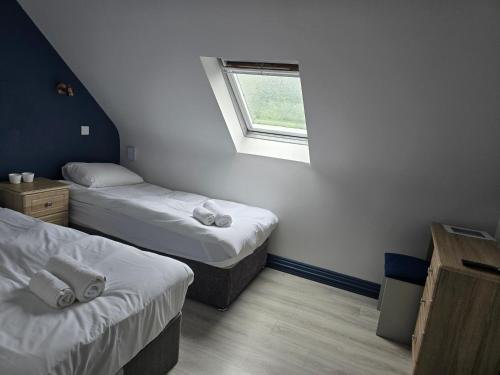 Postel nebo postele na pokoji v ubytování The Dutch Tulip Hotel