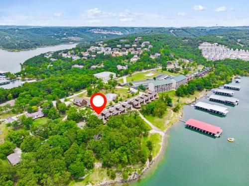 an aerial view of an island with a red marker at Worth the Wake in Branson