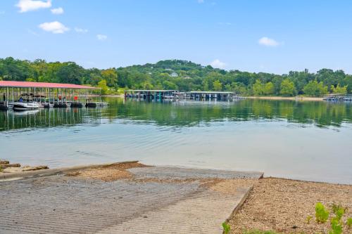 a large body of water with boats in it at Worth the Wake in Branson