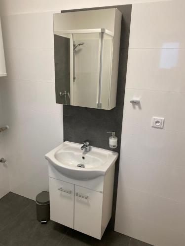 Ein Badezimmer in der Unterkunft JK Apartmány