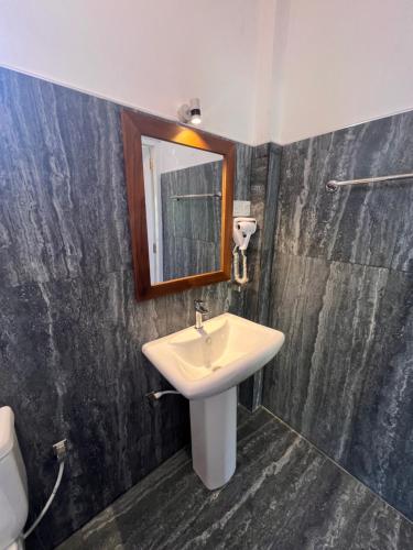 Koupelna v ubytování TEMBO Cottage Wilpattu