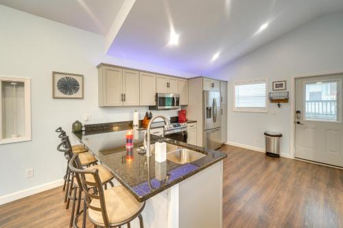 a kitchen with a sink and a counter top at Near Kanawha River Unique Renovated Home with Yard! in Glen Ferris