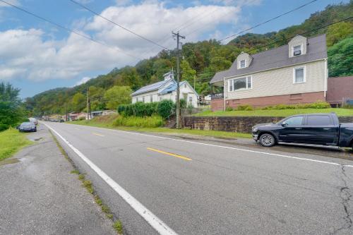 a black car parked on the side of a road at Near Kanawha River Unique Renovated Home with Yard! in Glen Ferris