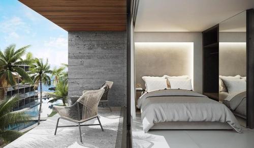 a bedroom with a bed and a balcony at Porto Alto Resort in Ipojuca
