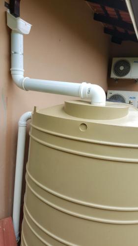 a water tank with a pipe on top of it at Zimbali View Eco Guesthouse in Ballito