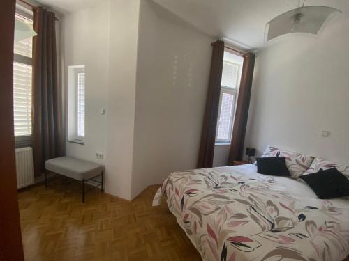 Postel nebo postele na pokoji v ubytování Apartma ROGATEC 2