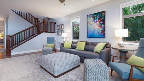 a living room with a couch and chairs at SEA GLASS Stunning 3BR KaMilo Home with Heated Pool and Best View in Waikoloa