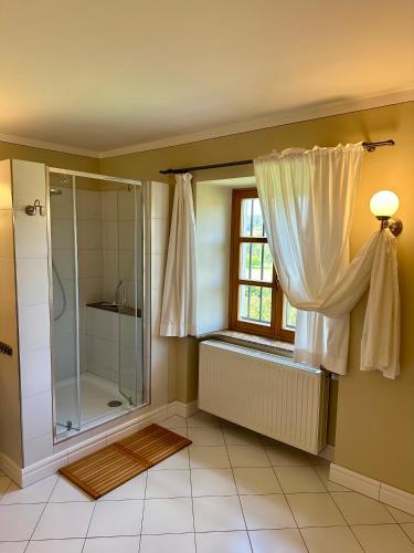 Cama o camas de una habitación en Statek Zahrádka Český Krumlov
