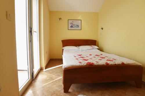 Postel nebo postele na pokoji v ubytování Vila Lux Tamara