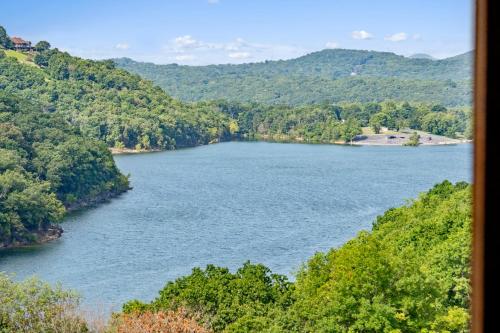 a view of a river with mountains in the background at Table Rock Lake Views, Free Daily Attraction Tickets, Cmty Amenities w Pools in Kimberling City