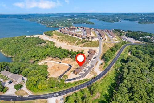 an aerial view of a road with a red sign at Table Rock Lake Views, Free Daily Attraction Tickets, Cmty Amenities w Pools in Kimberling City