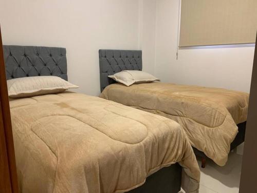 Katil atau katil-katil dalam bilik di Apartamento no Biopark Toledo Conforto e Requinte