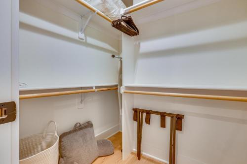 a room with a closet with a wooden floor at 6 Mi to Appalachian Trail Modern Front Royal Gem! in Paris