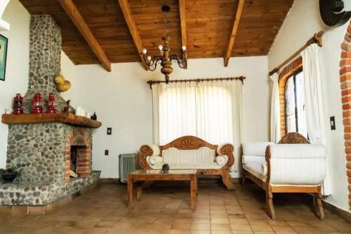 Posezení v ubytování Cabaña Amealco Cipreses