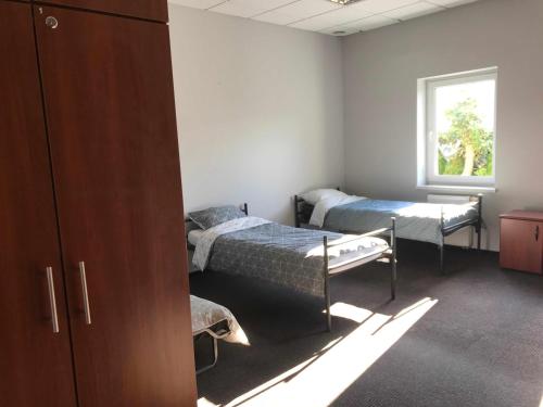 Postel nebo postele na pokoji v ubytování Hostel Iveda