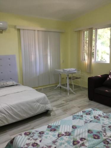 Postel nebo postele na pokoji v ubytování Ático riomar segundo piso