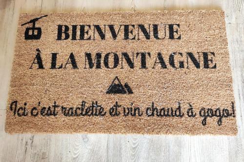 Un certificat, premiu, logo sau alt document afișat la Charmante maison de montagne
