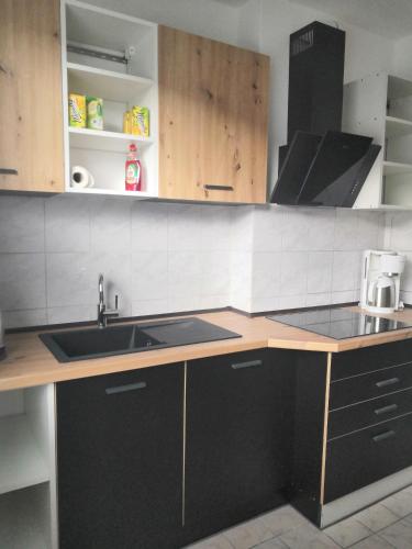 Η κουζίνα ή μικρή κουζίνα στο Monteurzimmer und Reisende