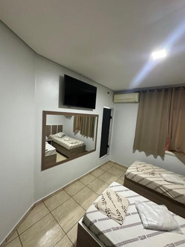 Postel nebo postele na pokoji v ubytování Hotel Maraja 9 de julho