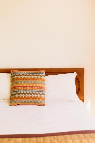 Un ou plusieurs lits dans un hébergement de l'établissement Hotel Las Palmas