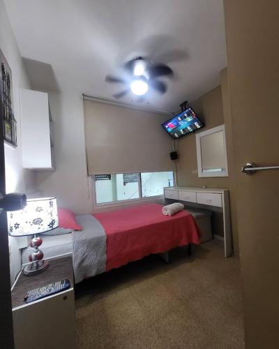 Voodi või voodid majutusasutuse Habitaciones R-6 toas