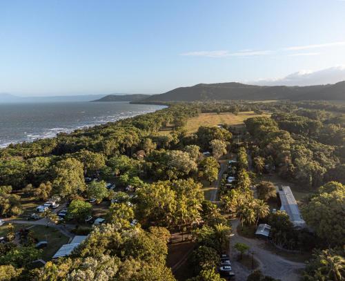 an aerial view of a park next to the ocean at Daintree Beach Resort in Wonga