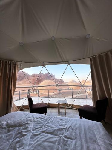 Postel nebo postele na pokoji v ubytování Wadi Rum Bedouin style camp