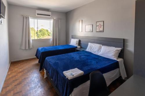 Postel nebo postele na pokoji v ubytování Euro Hotel