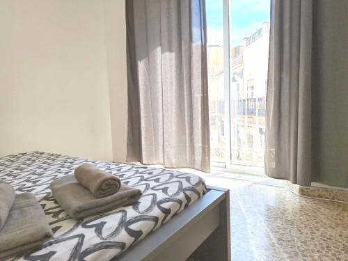 Posteľ alebo postele v izbe v ubytovaní Sunny Malaga Centre Flats, 2 Options, with Balcony or Terrace