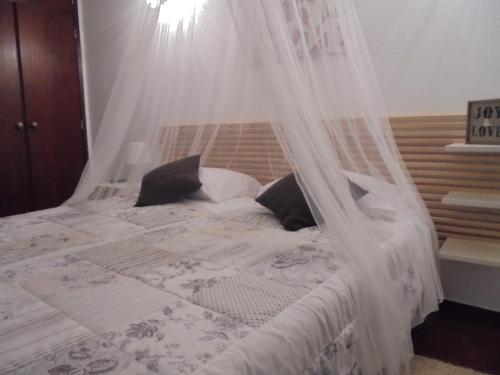
A bed or beds in a room at Lagos Charming Villas
