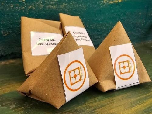a pile of brown paper bags sitting on a table at Insda Wellness Resort in Chiang Mai