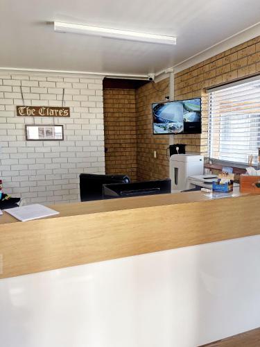 a counter in a restaurant with a counter top at Squatters Homestead Motel in Casino
