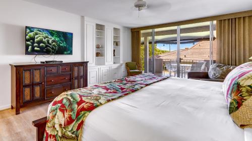 En eller flere senge i et værelse på Maui Eldorado D200 - 2 Bedroom