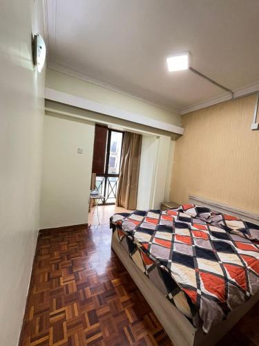 Ένα ή περισσότερα κρεβάτια σε δωμάτιο στο Azzalea 3-Bedroom Apartment Cameron Highlands