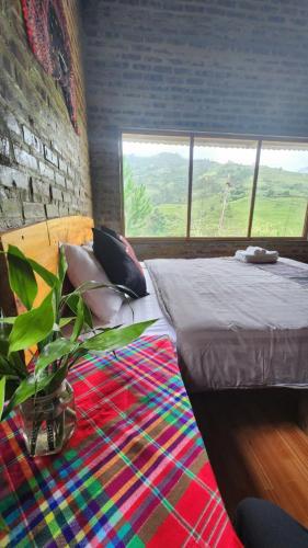 Postel nebo postele na pokoji v ubytování Mu Cang Chai Eco Home