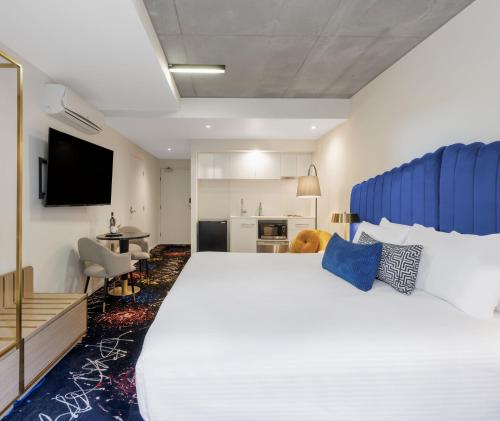 Oaks Melbourne St Kilda Road Hotelにあるベッド