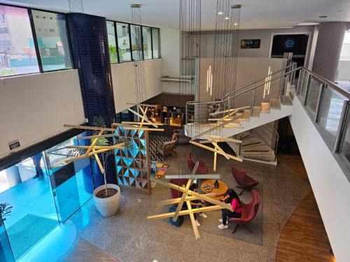 an overhead view of a room with a slide and a playground at Flat Beira Mar Meireles in Fortaleza