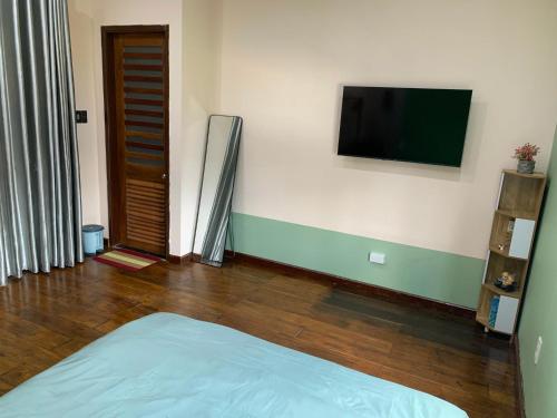 Et tv og/eller underholdning på The Light Corner Huế