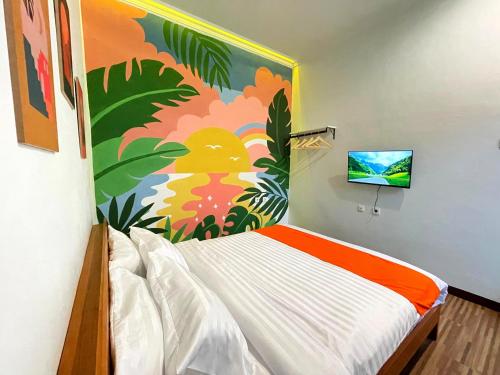 Postel nebo postele na pokoji v ubytování ROOM Ijen Hostel