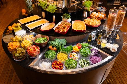a buffet filled with lots of different types of vegetables at Hotel Granvia Osaka-JR Hotel Group in Osaka