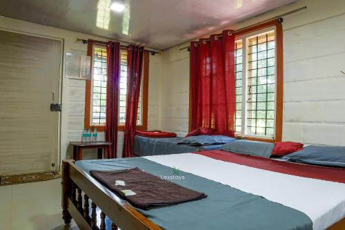 Postel nebo postele na pokoji v ubytování D signature Homestay By Lexstays