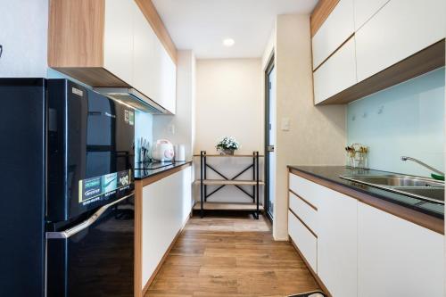 Η κουζίνα ή μικρή κουζίνα στο Saigon Downtown - Rivergate Residence