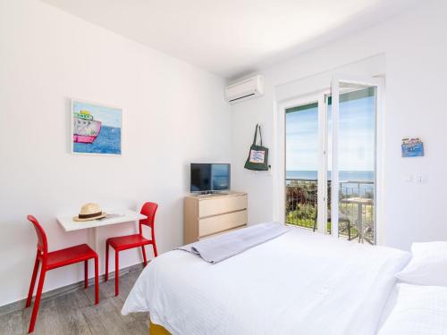 เตียงในห้องที่ Apartments Villa Lukas - ''No 7'' Studio Apartment with Balcony and Sea View