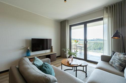 TV a/nebo společenská místnost v ubytování Astenblick Apartments Winterberg with sauna