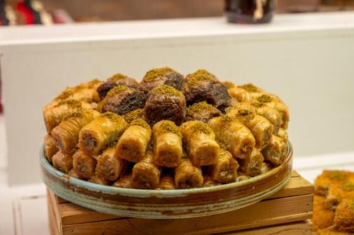 a pile of food in a bowl on a table at AQI Pegasos Royal in Avsallar